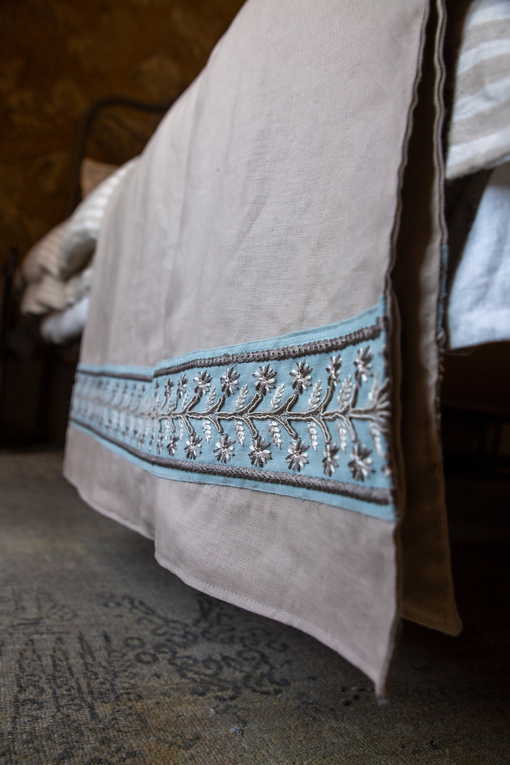 Linen throws with embroided linen trim detail