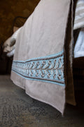 Linen throws with embroided linen trim detail