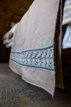 Linen throws with embroided linen trim detail